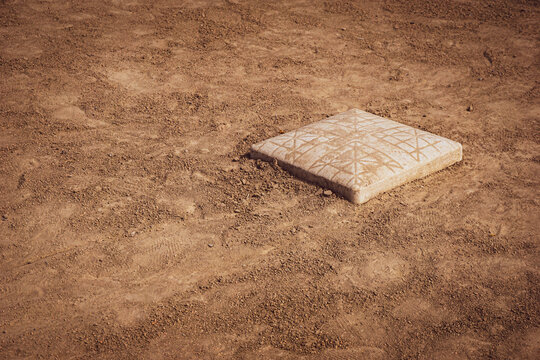 Second base on dirt baseball and softball field