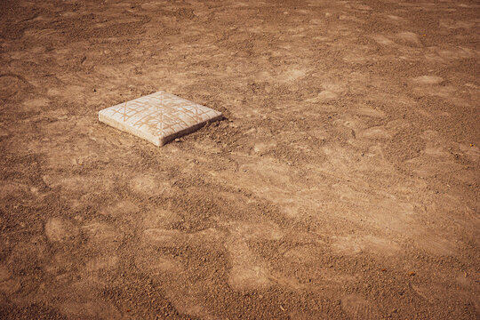 Second base on dirt baseball and softball field