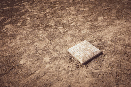 Second base on dirt baseball and softball field