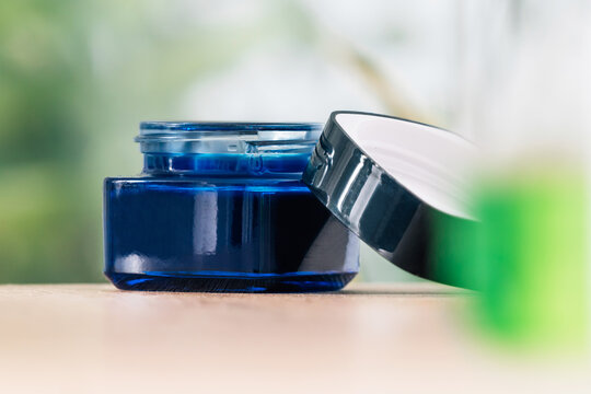 Luxury Blue Cosmetic Jar with Open Lid on Soft Background &ndash; Skincare Cream, Moisturizer Packaging, Beauty Product Mockup
