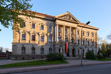 Naklejka premium Altenburg / Germany: District office building in a former ducal ministerial building from the late 19th century in the evening sun