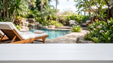 Obraz premium White Wooden Table Top with Blurred Luxury Pool Garden Background for Product Display