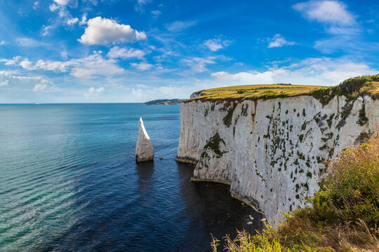 Old Harry Rocks White Chalk Cliffs at Jurassic Coast in Dorset, England, UK at Sunset