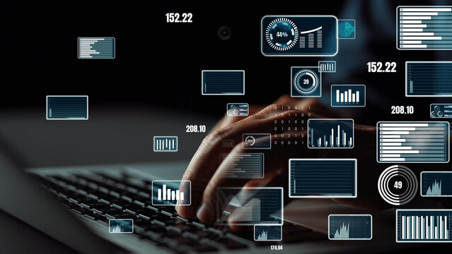A captivating view of a hand typing on a laptop keyboard with an array of digital graphs and metrics hovering in the dark background, representing data analysis. Xenic