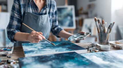 Obraz premium Artist at Work in Bright Studio with Palette and Canvas Creating Abstract Painting