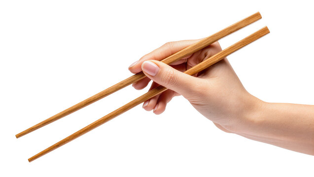 Female hand holding wooden chopsticks, isolated on transparent background