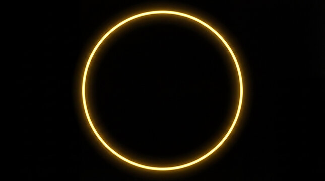 glowing yellow circle light on black background