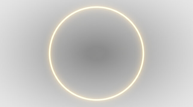 glowing yellow neon circle light on black background