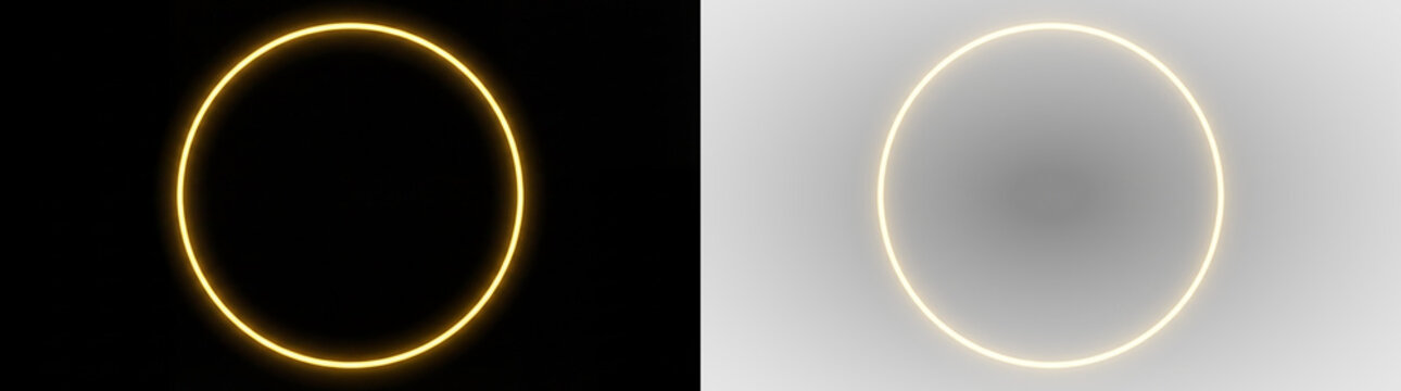 two glowing yellow light rings on black background