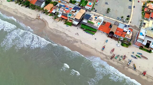 Close Aerial View of Beach Bars, Hotels and Fishing Boats on Northeast Brazil Shoreline