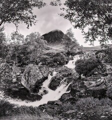 Waterfalls in Scottish highlands of Glencoe with Buachaille Etive Mór mountain in Ballachulish, UK (Black and White) © Jonathan Dakin