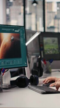 Vertical Video Employee operating AI chatbot to generate Mars and cosmic visuals, transforming text prompts and creating videos of the solar system. Generating extraterrestrial world content on