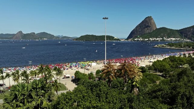 Drone Footage in Orbital mode from Flamengo landfill (Aterro do Flamengo) with beach in front and sugar loaf background.