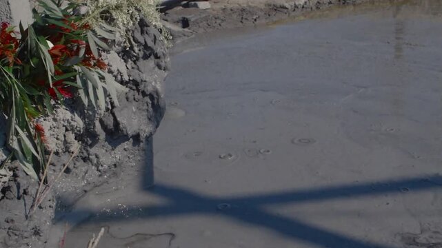 Crude oil and natural gas bubbling to the surface in an unregulated oil field in Myanmar