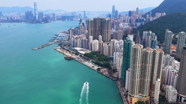 Sai Ying Pun and Kennedy Town drone shot of traditional heritage sites mixed with modern luxury skyscrapers along the Victoria Harbour waterfront in Western District Hong Kong