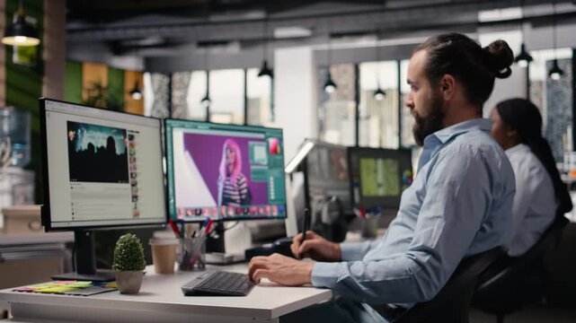 Male specialist editing photography on computer with retouching software tools, color grading and image selection for editorial materials. Creative agency for commercial content.