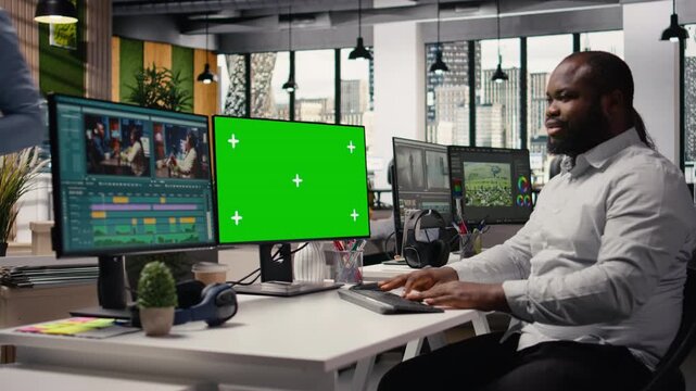 Isolated mockup with man working on video montage project, modern production of filmmaking in agency office. Engineer develop cinematic content using advanced post production software.