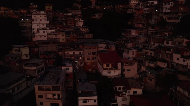 Drone Footage, Aerial view of Houses in of Favela Located in Catete Rio de Janeiro in the morning light sun
