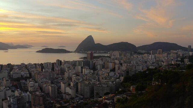 Drone Footage, Aerial View of Sunrise from Catete neighborhood with Sugar Loaf Background 