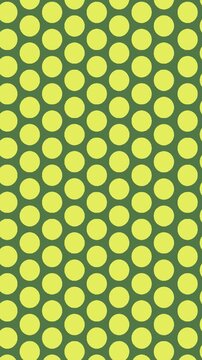 a green and yellow pattern with circles