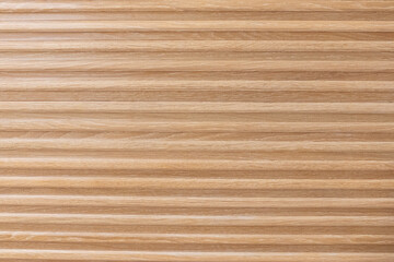 ribbed, light brown wood wall tile texture © Renata