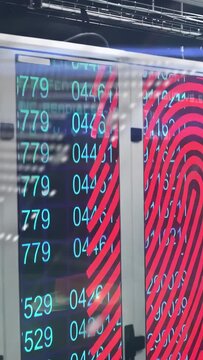 Vertical video: LED panels starting with fingerprint shift, updating numbers and panning for demo