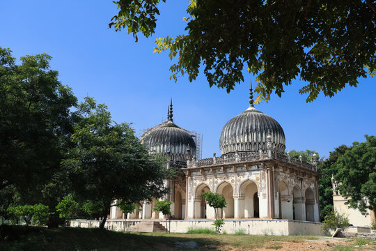 Qutb Shahi Tombs in Hyderabad complex under blue sky