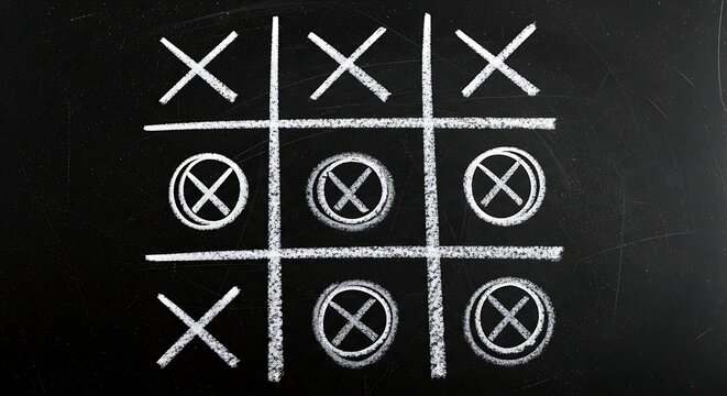 Chalk drawn Tic Tac Toe grid game on a dark textured school blackboard