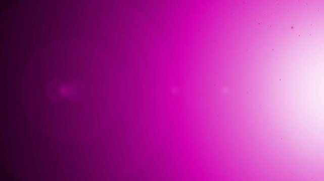 Abstract purple and pink glowing background with soft bokeh lights and bright decorative patterns