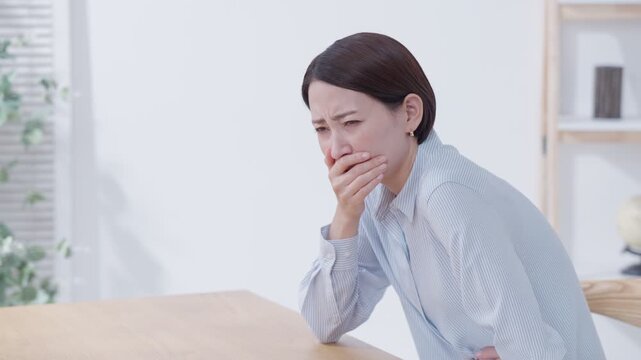 吐き気がある女性