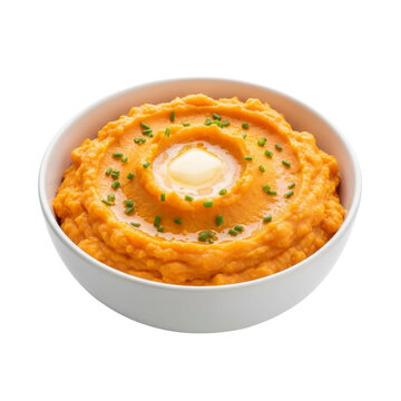 Bowl of mashed sweet potatoes with butter and chives