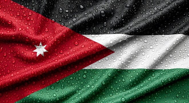 The national flag of Jordan, featuring its distinct black, white, and green stripes with a red triangle and white seven-pointed star, covered in glistening water droplets.
