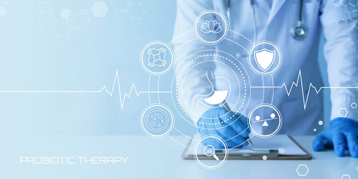 Doctor wearing blue gloves and white lab coat uses a pen to write on a clipboard while medical icons and a heartbeat line hover around a stomach graphic representing probiotic therapy science