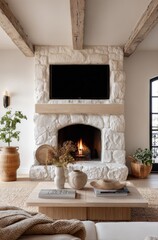 Obraz premium Cozy Living Room with Stone Fireplace, Mounted TV, and Modern Farmhouse Decor Accents