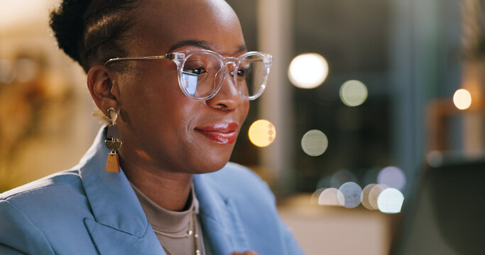 Night, glasses or black woman in office with laptop, draft edit or fact checking in article review. Bokeh, specs or journalist in agency with tech, proofreading or industry research in overtime.