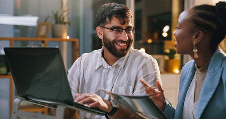 Team, laughing and people with laptop in business, working late and journalist with article deadline. Newsroom, man and woman with smile for funny story, online or publishing with technology at night