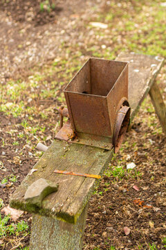 Old Hand-Cranked Corn Sheller on a in the traditional village way