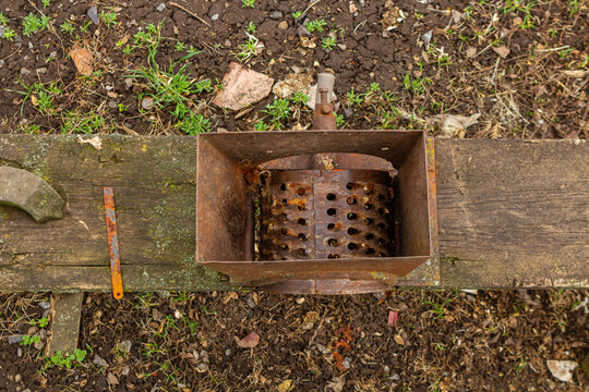 Old Hand-Cranked Corn Sheller on a in the traditional village way