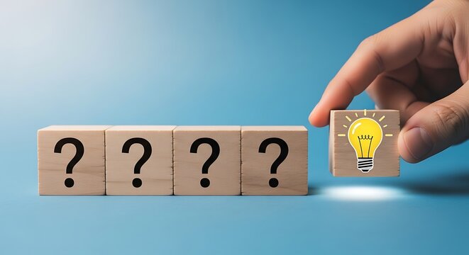 Hand replacing question mark with light bulb on wooden blocks, symbolizing idea and solution