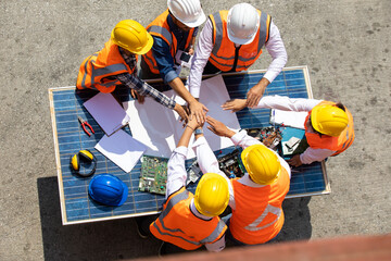 Ethnic diversity worker people, Success teamwork. Group of professional engineering people wearing hardhat safety helmet meeting with solar photovoltaic panels discussion in new project © NVB Stocker