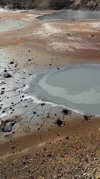 Bubbling geothermal mud pots and steam vents at Krysuvik geothermal area, Reykjanes peninsula, Iceland