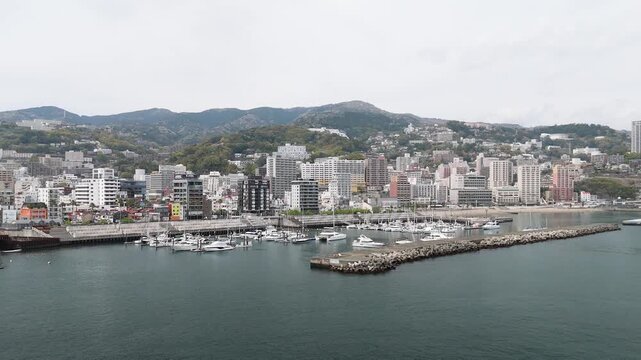 Aerial View of Atami City Along Sagami Bay Coastline Japan