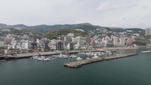 Aerial View of Atami City Along Sagami Bay Coastline Japan
