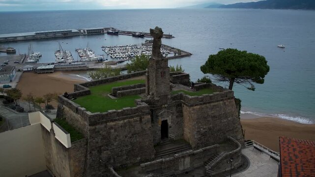 Aerial footage of El Cano monument in Getaria village, Basque Country. High quality 4k drone footage