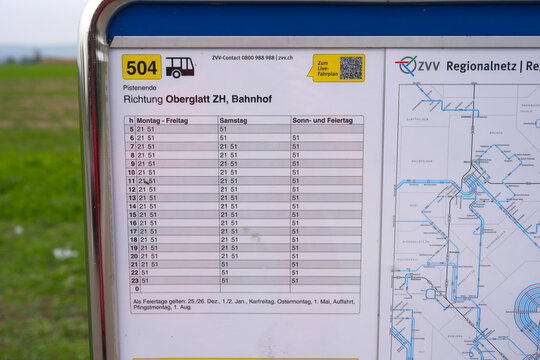 Close-up of timetable at Pistenende station of Swiss Post bus at Swiss village of Oberglatt on a cloudy autumn day. Photo taken October 3rd, 2025, Zurich Oberglatt, Switzerland.