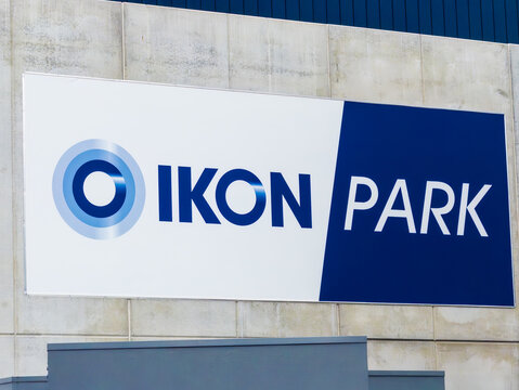 Carlton, Victoria, Australia, April 14, 2026: Blue and white metal sign for IKON PARK football ground in Carlton, mounted on a concrete wall. An iconic Australian rules football oval