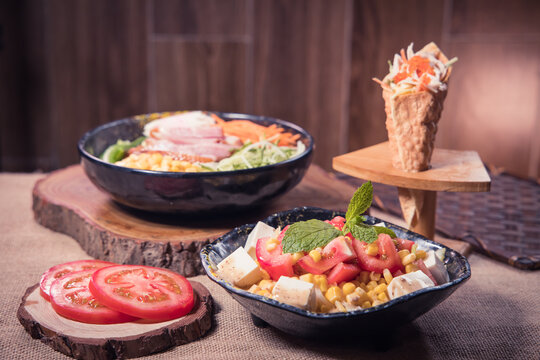 Fresh salad bowl with tofu and corn