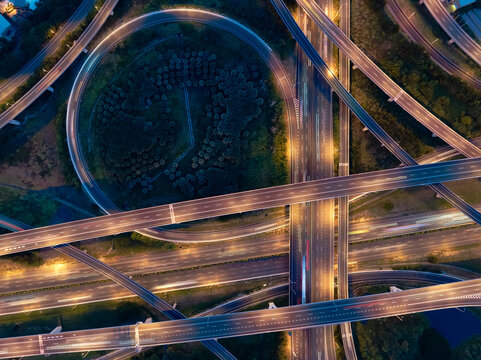 Aerial View of Highway Interchange - Transport concept image, long exposure birds eye view use the drone in Taoyuan International Airport System Interchange, Taoyuan, Taiwan.