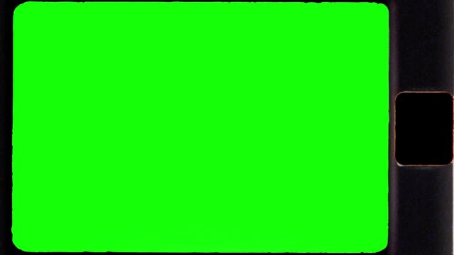 Authentic super 8mm film frame with green screen