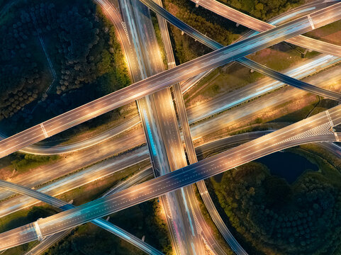 Aerial View of Highway Interchange - Transport concept image, long exposure birds eye view use the drone in Taoyuan International Airport System Interchange, Taoyuan, Taiwan.